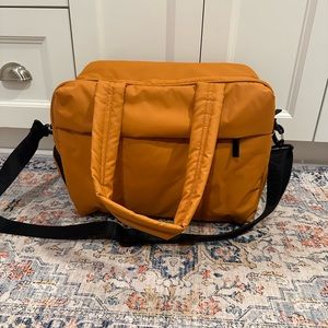 Calpak Luka Duffel Bag in Pumpkin NWOT